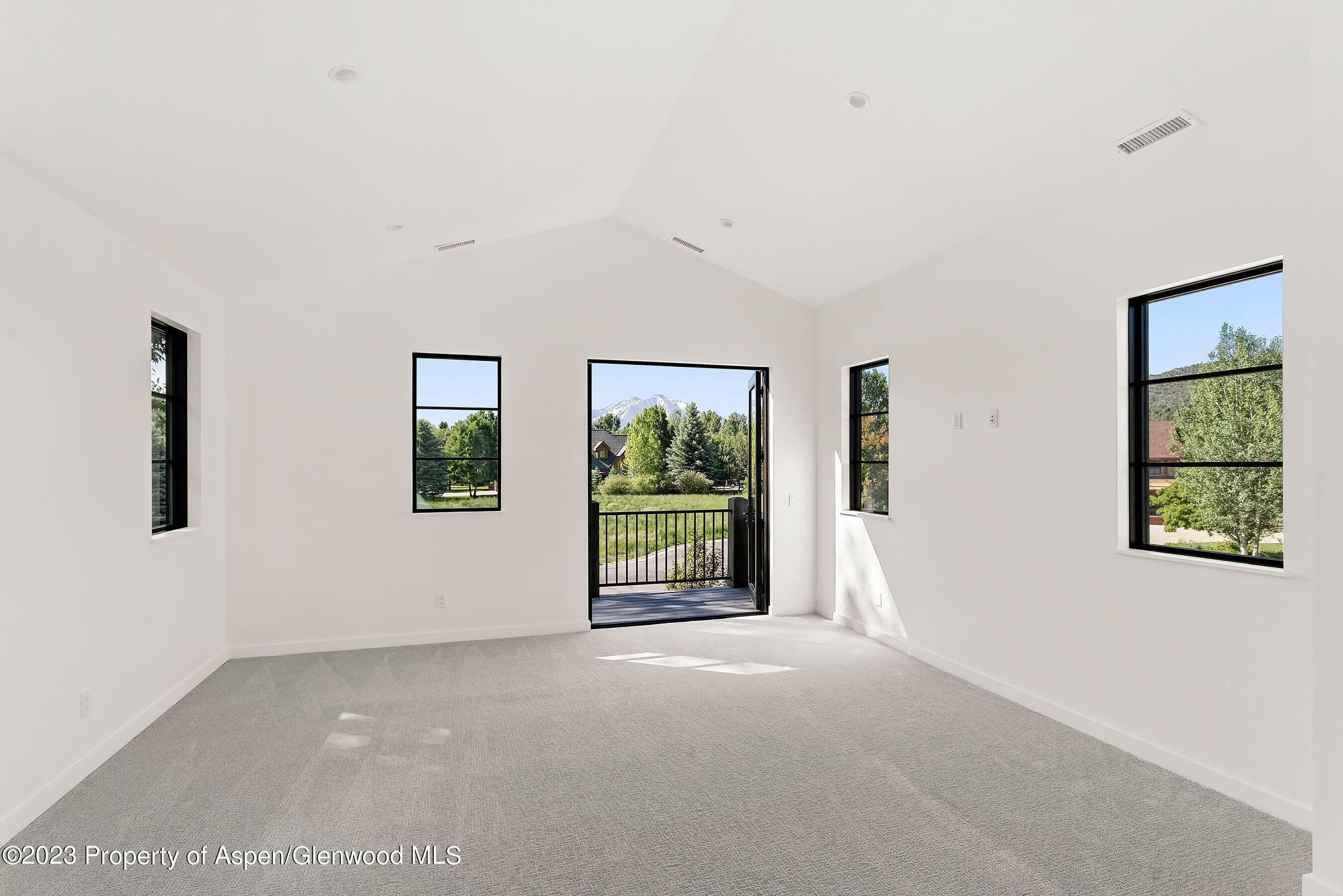 89 Fox Prowl Lane Carbondale, CO 81623 - Photo 8 of 15 an empty room with windows