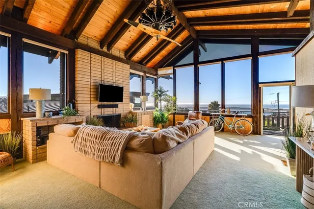 a kitchen with granite countertop white cabinets and a sink