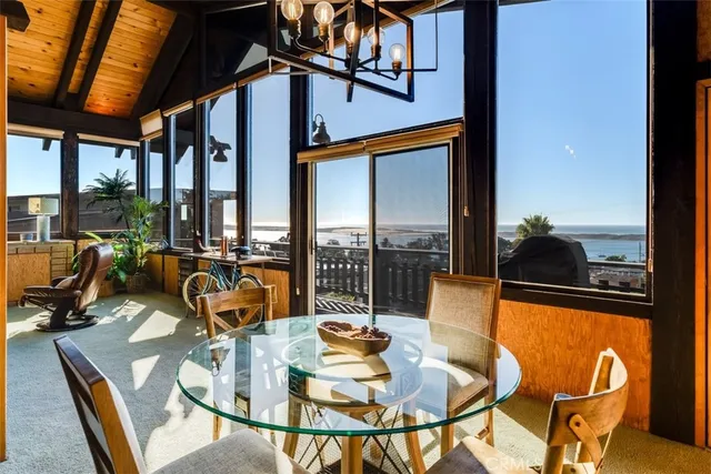 a view of balcony with wooden floor