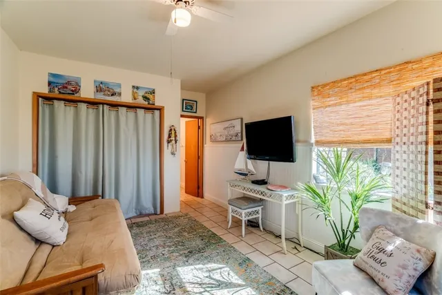a view of a table and chairs under an umbrella