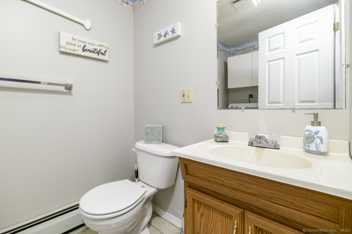 10 Hoinski Way Ansonia, CT 06401 - Photo 20 of 30 a bathroom with a sink a toilet and vanity
