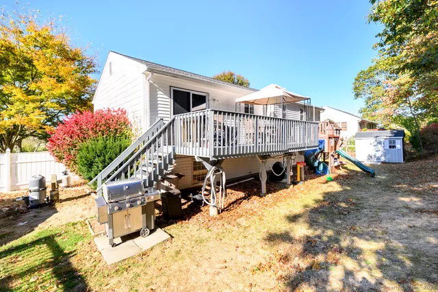 a view of backyard and tree