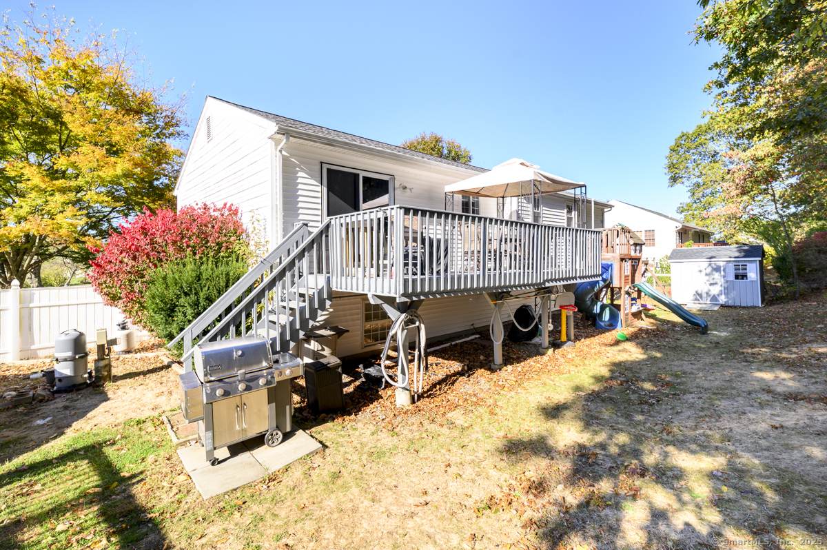 10 Hoinski Way Ansonia, CT 06401 - Photo 24 of 30 a view of a house with a wooden deck