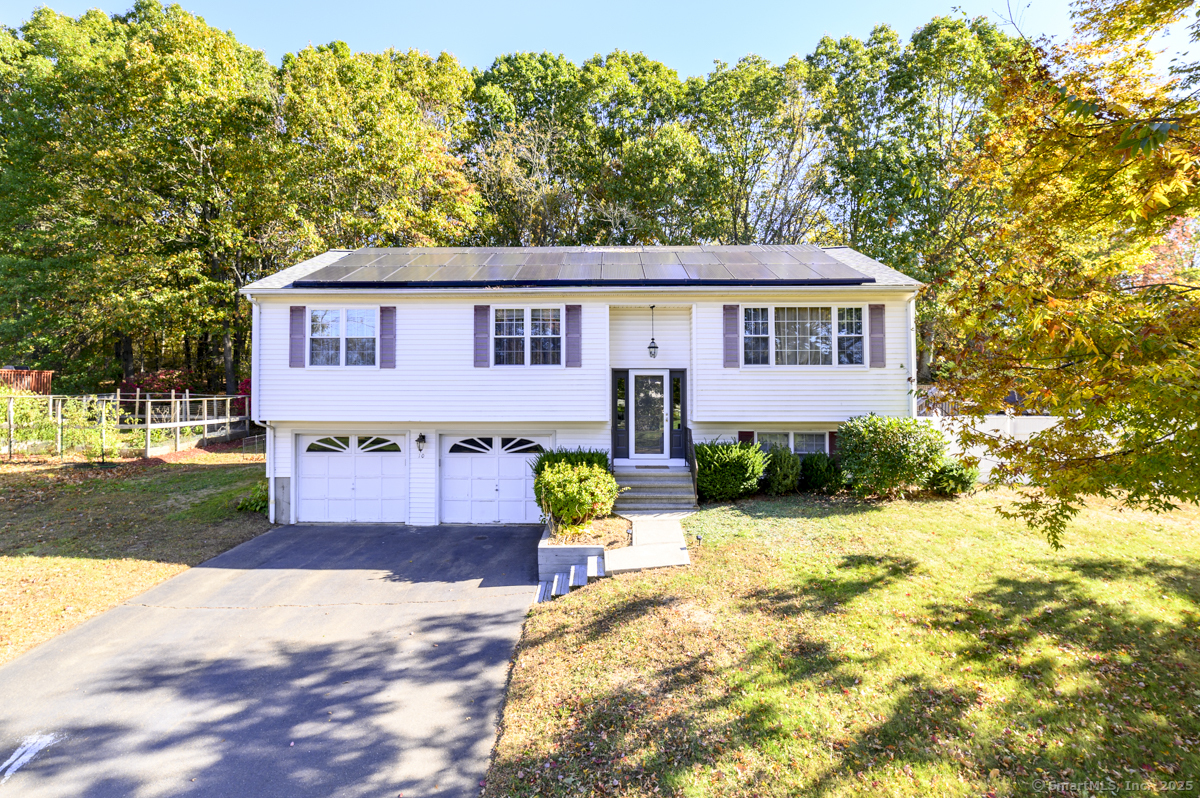 10 Hoinski Way Ansonia, CT 06401 - Photo 28 of 30 a front view of a house with a yard and trees