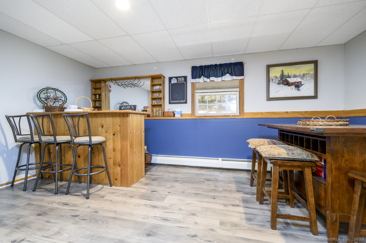 10 Hoinski Way Ansonia, CT 06401 - Photo 3 of 30 a view of a dining room with furniture and window