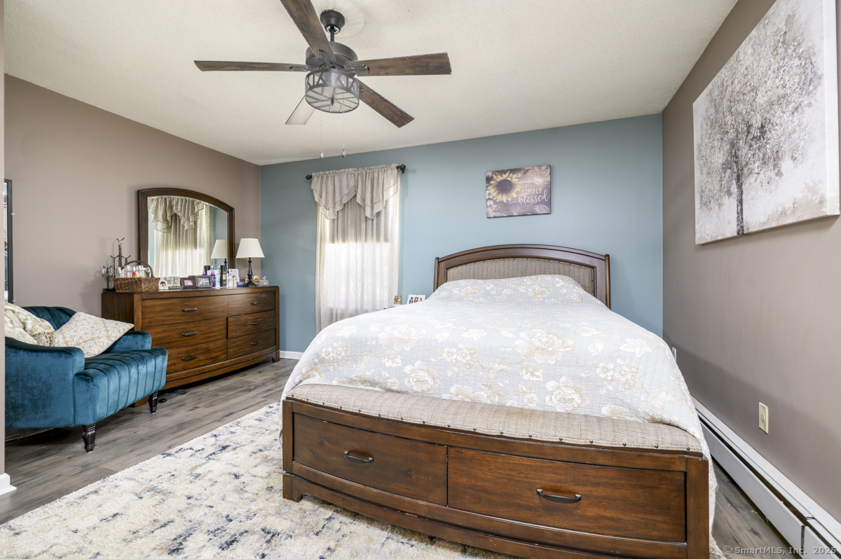 10 Hoinski Way Ansonia, CT 06401 - Photo 7 of 30 a bedroom with a bed and dresser