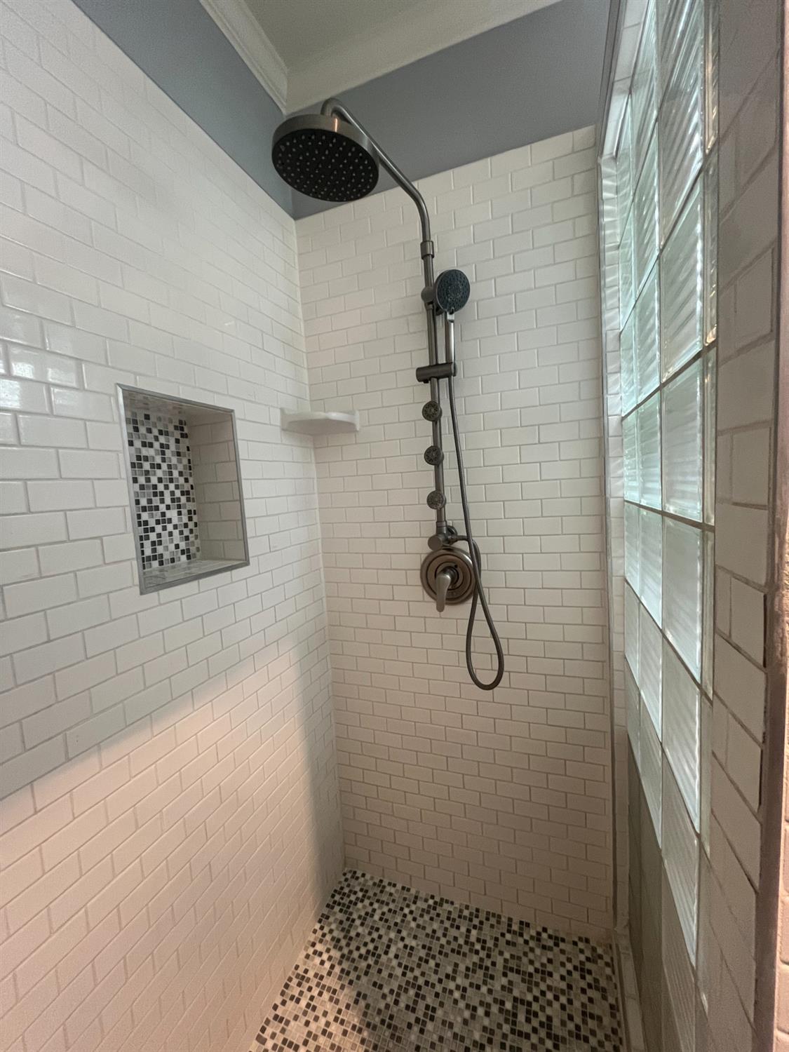 471 South Reed Avenue Reedley, CA 93654 - Photo 31 of 54 a bathroom with a shower