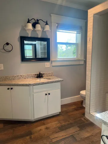 a backyard of a house with lots of green space