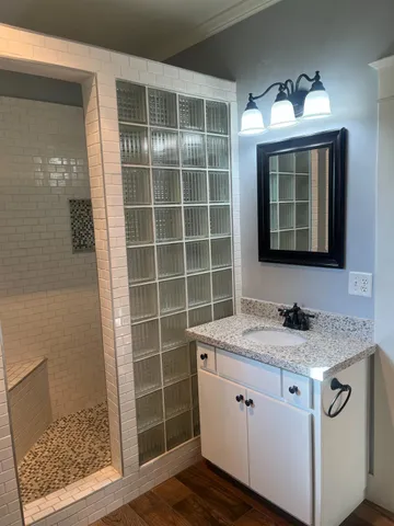 a backyard of a house with plants and trees