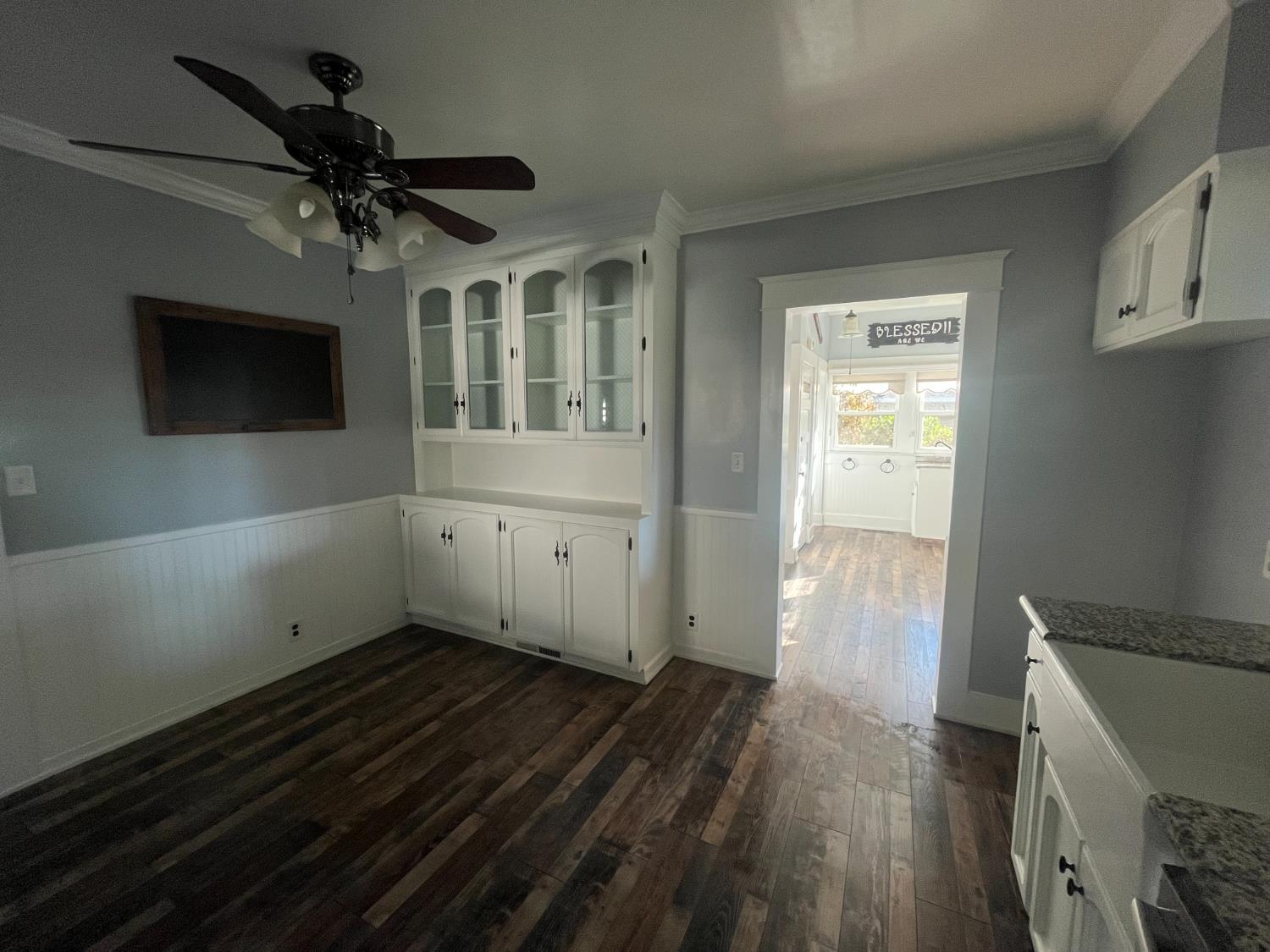 471 South Reed Avenue Reedley, CA 93654 - Photo 38 of 54 a view of empty room with wooden floor and fan