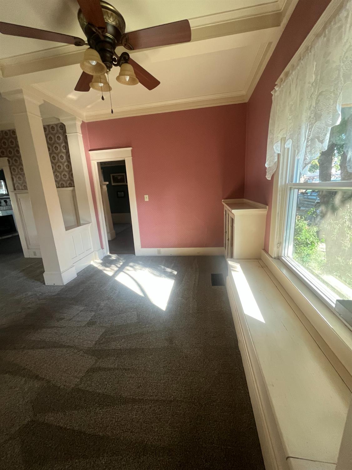 471 South Reed Avenue Reedley, CA 93654 - Photo 5 of 54 a view of a livingroom with a ceiling fan and window