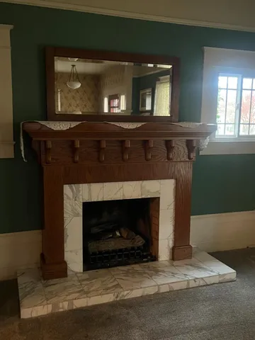 a kitchen with a stove a sink and a microwave