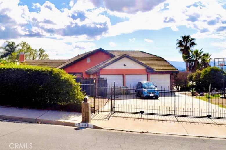 6098 Baldwin Avenue Riverside, CA 92509 - Photo 1 of 1 a view of a street with a building in the background