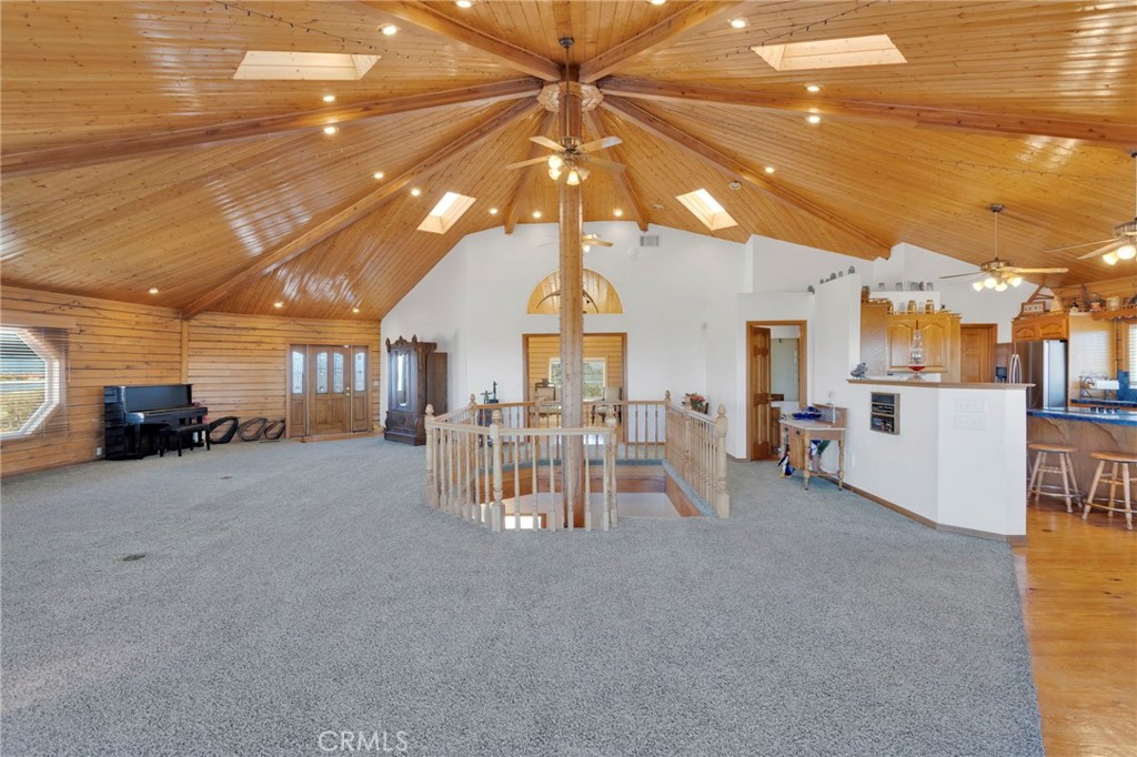 10328 El Centro Road Oak Hills, CA 92344 - Photo 15 of 43 a view of a room with gym equipment and a chandelier