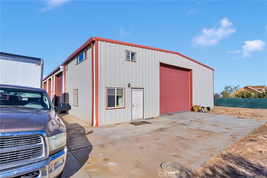 10328 El Centro Road Oak Hills, CA 92344 - Photo 30 of 43 a front view of a house with windows