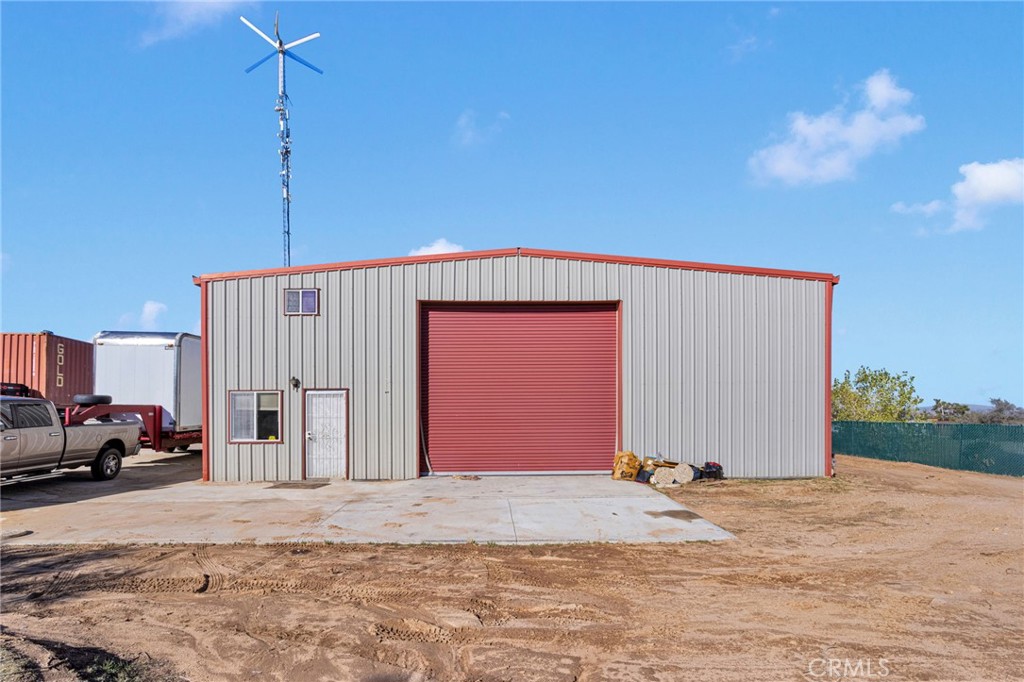 10328 El Centro Road Oak Hills, CA 92344 - Photo 32 of 43 a view of a house with a snow in the background