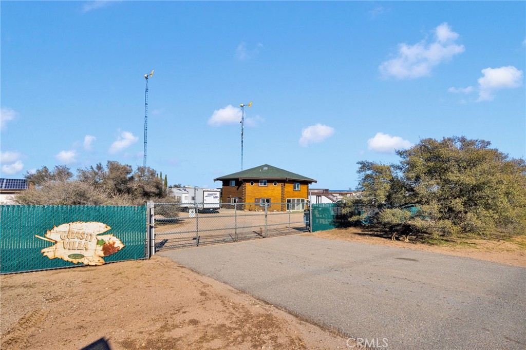 10328 El Centro Road Oak Hills, CA 92344 - Photo 4 of 43 a view of a house with a patio