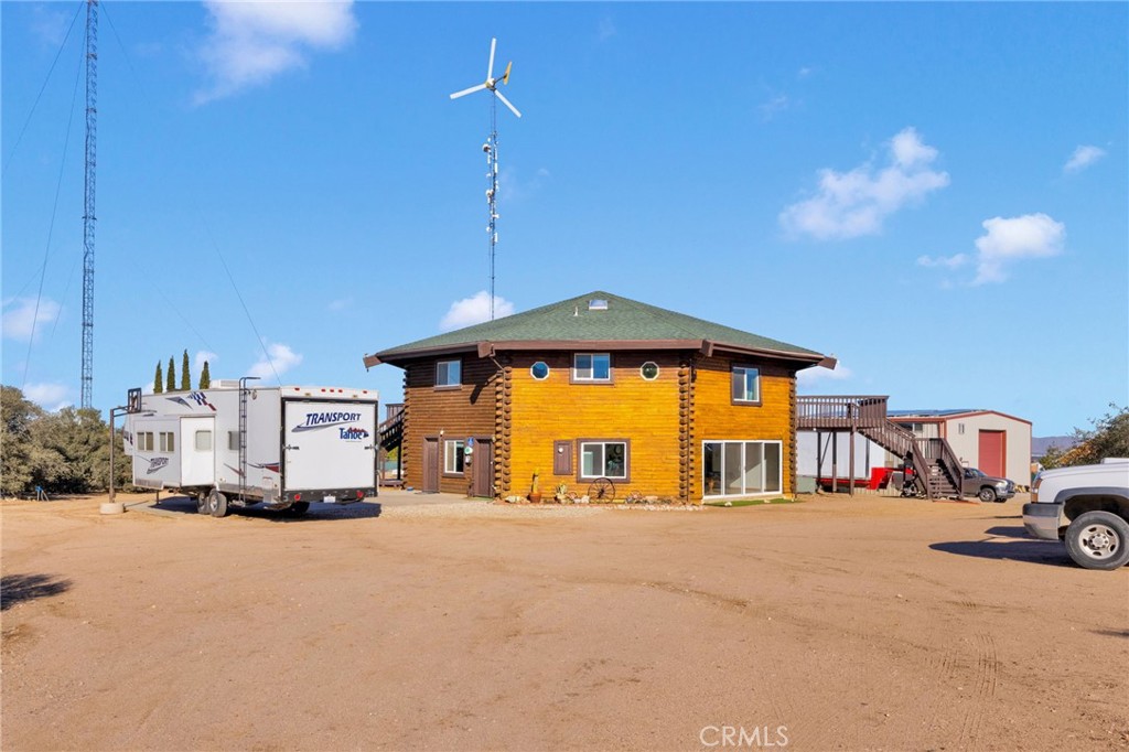 10328 El Centro Road Oak Hills, CA 92344 - Photo 5 of 43 a view of a house with a street