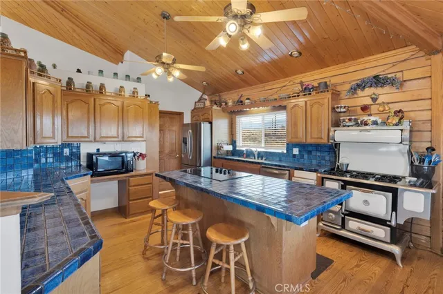 a bathroom with a toilet a sink and shower