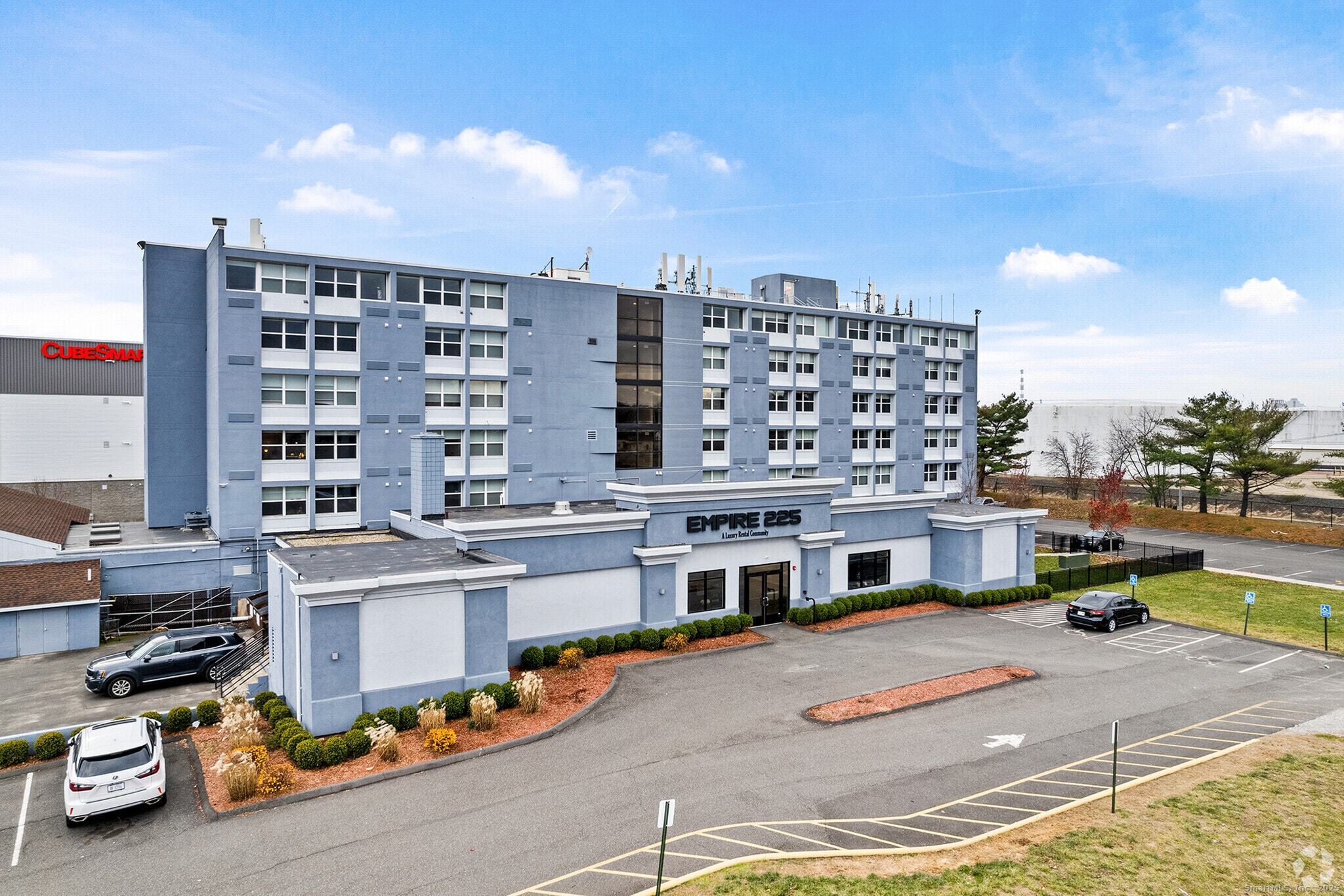 225 Lordship Boulevard, Unit 1F Stratford, CT 06615 - Photo 1 of 19 a city view with tall buildings