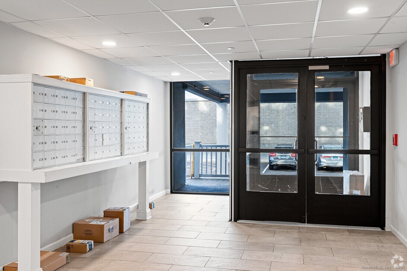 225 Lordship Boulevard, Unit 1F Stratford, CT 06615 - Photo 12 of 19 a view of a hallway with windows
