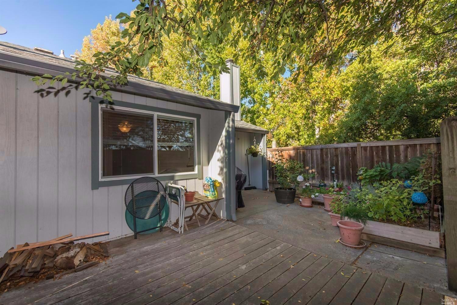 456 Occidental Circle Santa Rosa, CA 95401 - Photo 1 of 1 Back deck with room for gardening and entertaining