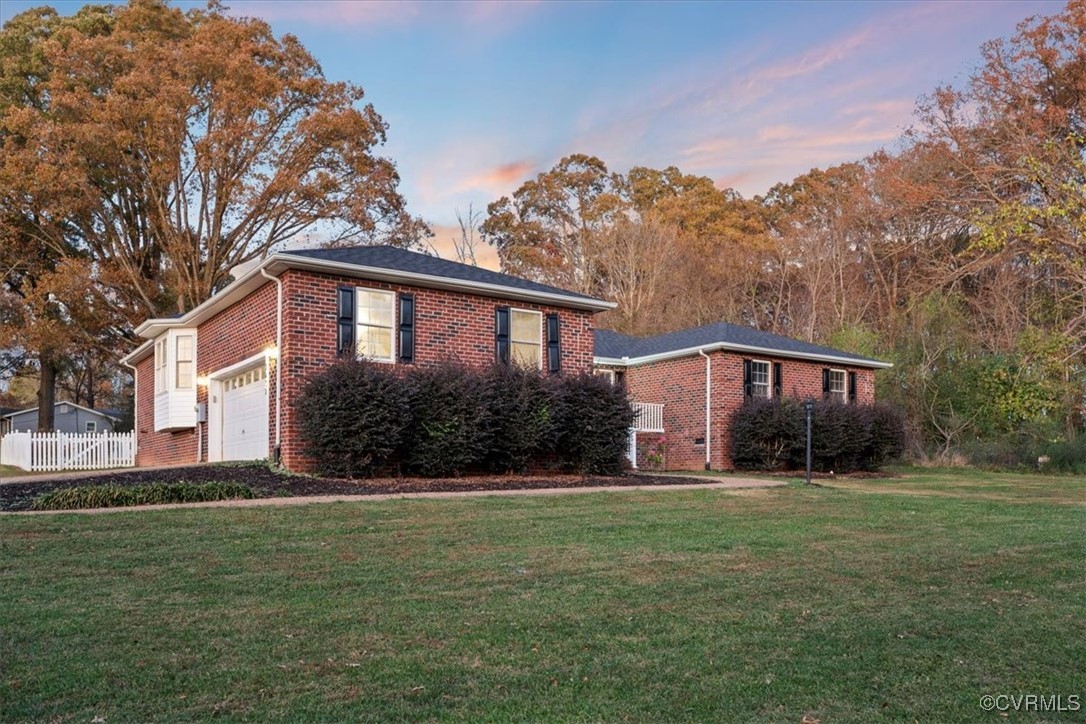 3420 Ceasar Town Road Powhatan, VA 23139 - Photo 3 of 50 Property exterior at dusk featuring a garage and a