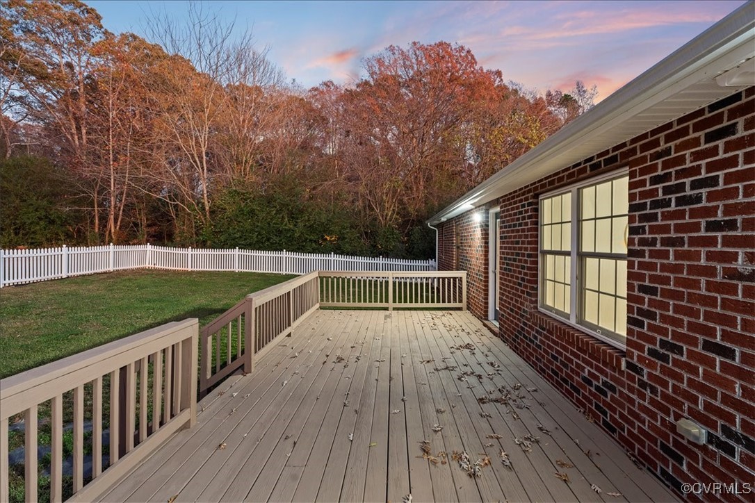 3420 Ceasar Town Road Powhatan, VA 23139 - Photo 50 of 50 Deck at dusk featuring a yard