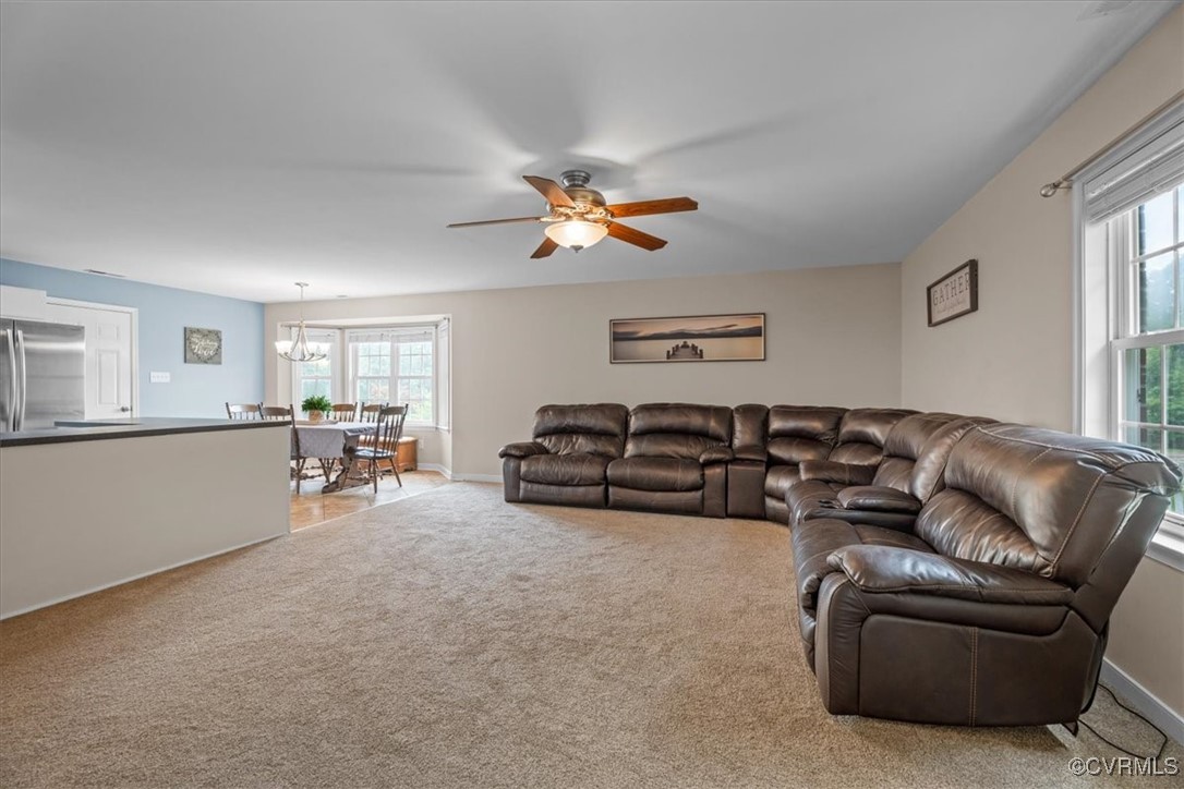 3420 Ceasar Town Road Powhatan, VA 23139 - Photo 7 of 50 Living room featuring light colored carpet and cei