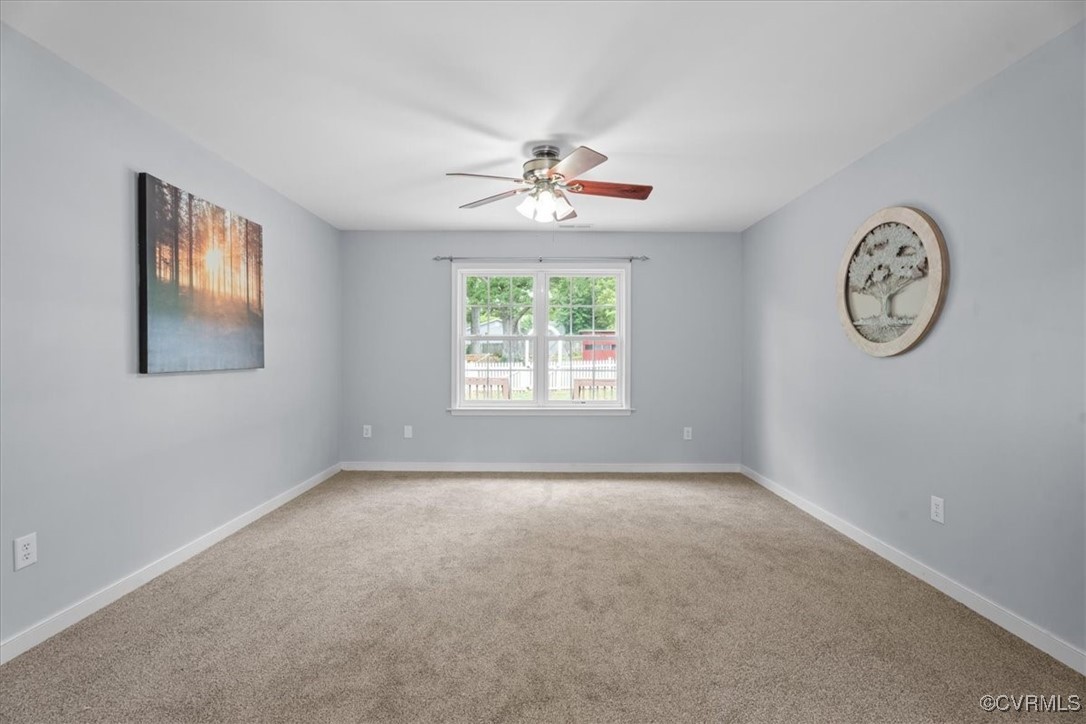 3420 Ceasar Town Road Powhatan, VA 23139 - Photo 10 of 50 Carpeted empty room featuring ceiling fan