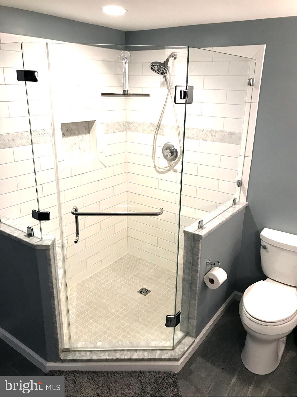 3112 Newcastle Lane Riva, MD 21140 - Photo 11 of 27 a bathroom with a toilet and a shower