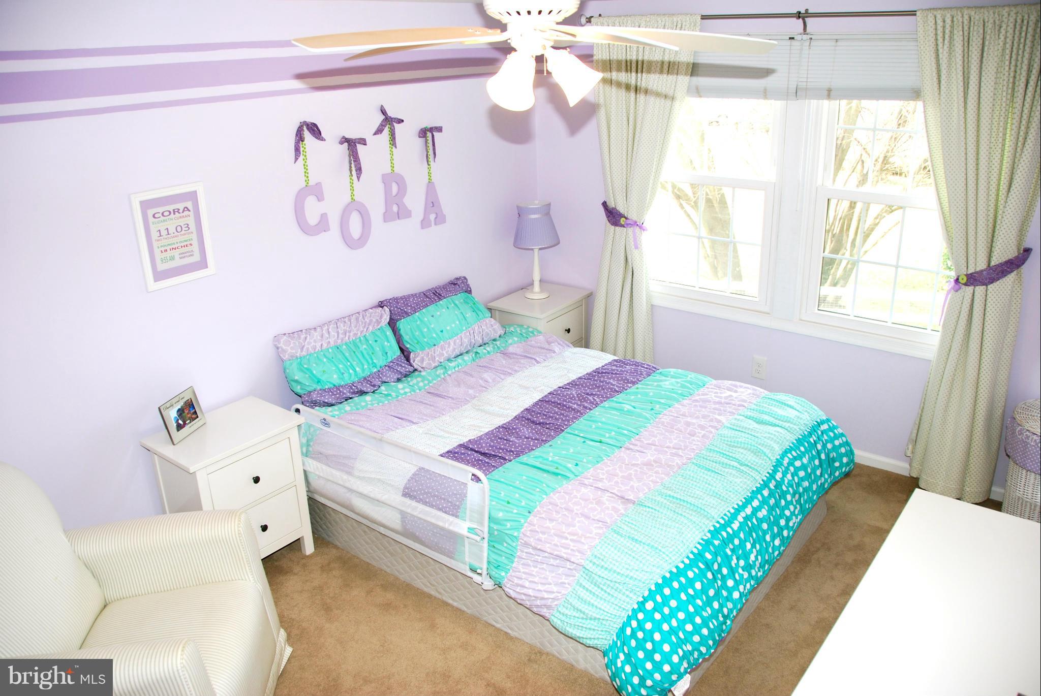 3112 Newcastle Lane Riva, MD 21140 - Photo 13 of 27 a bedroom with a bed and a painting on the wall