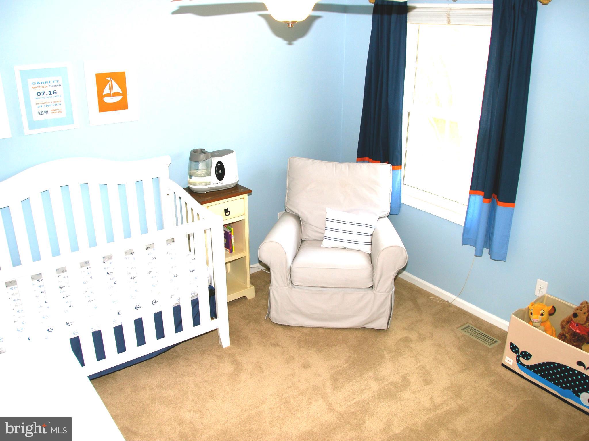 3112 Newcastle Lane Riva, MD 21140 - Photo 14 of 27 a bedroom with furniture and a window