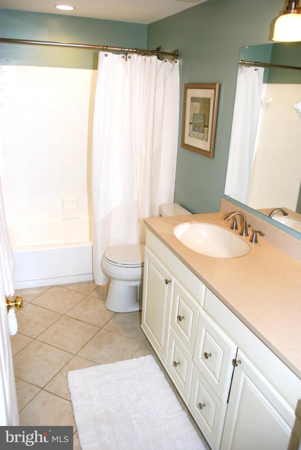 3112 Newcastle Lane Riva, MD 21140 - Photo 16 of 27 a bathroom with a sink a toilet and a mirror