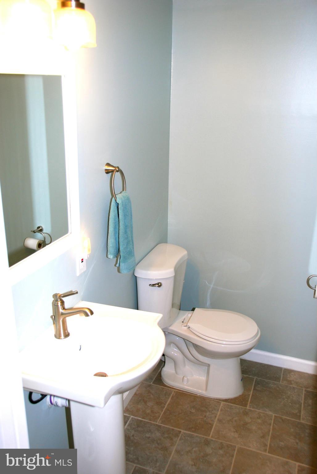 3112 Newcastle Lane Riva, MD 21140 - Photo 17 of 27 a bathroom with a toilet and a mirror