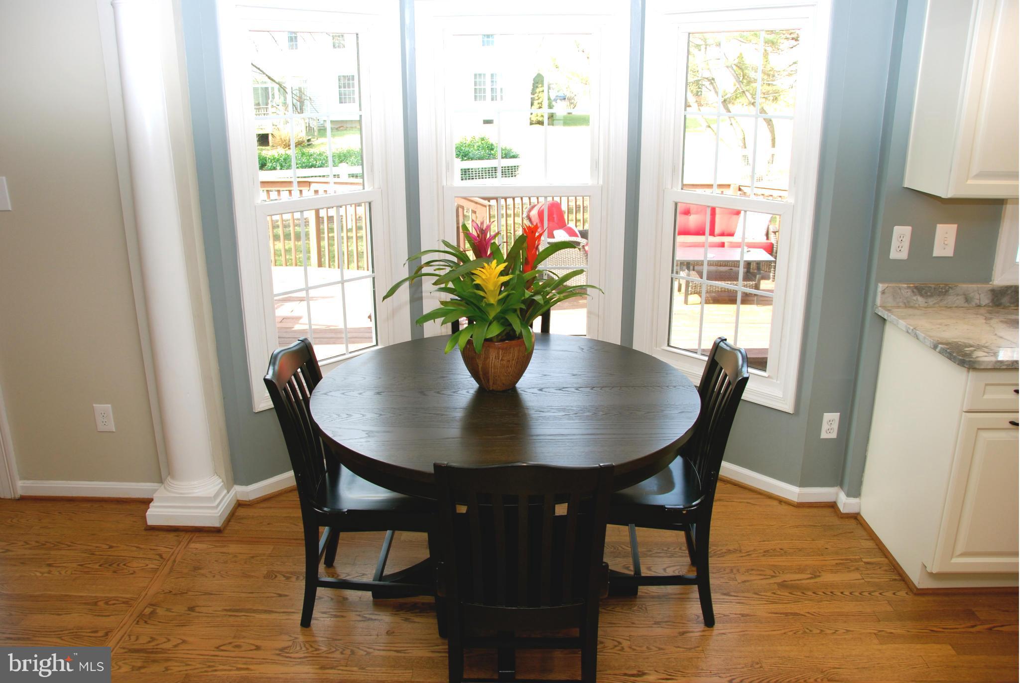 3112 Newcastle Lane Riva, MD 21140 - Photo 5 of 27 a view of a dining room with furniture and wooden floor