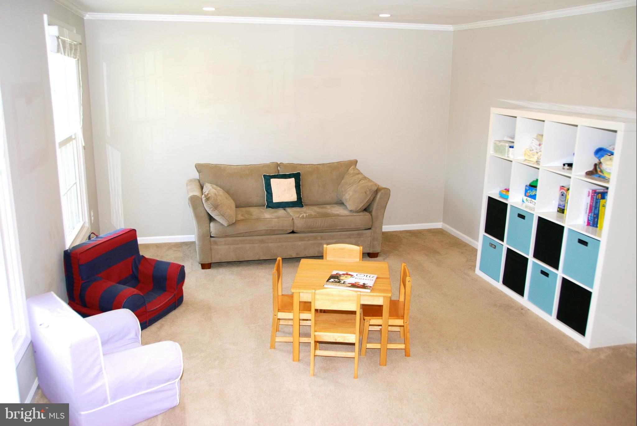 3112 Newcastle Lane Riva, MD 21140 - Photo 8 of 27 a living room with furniture and a wooden floor