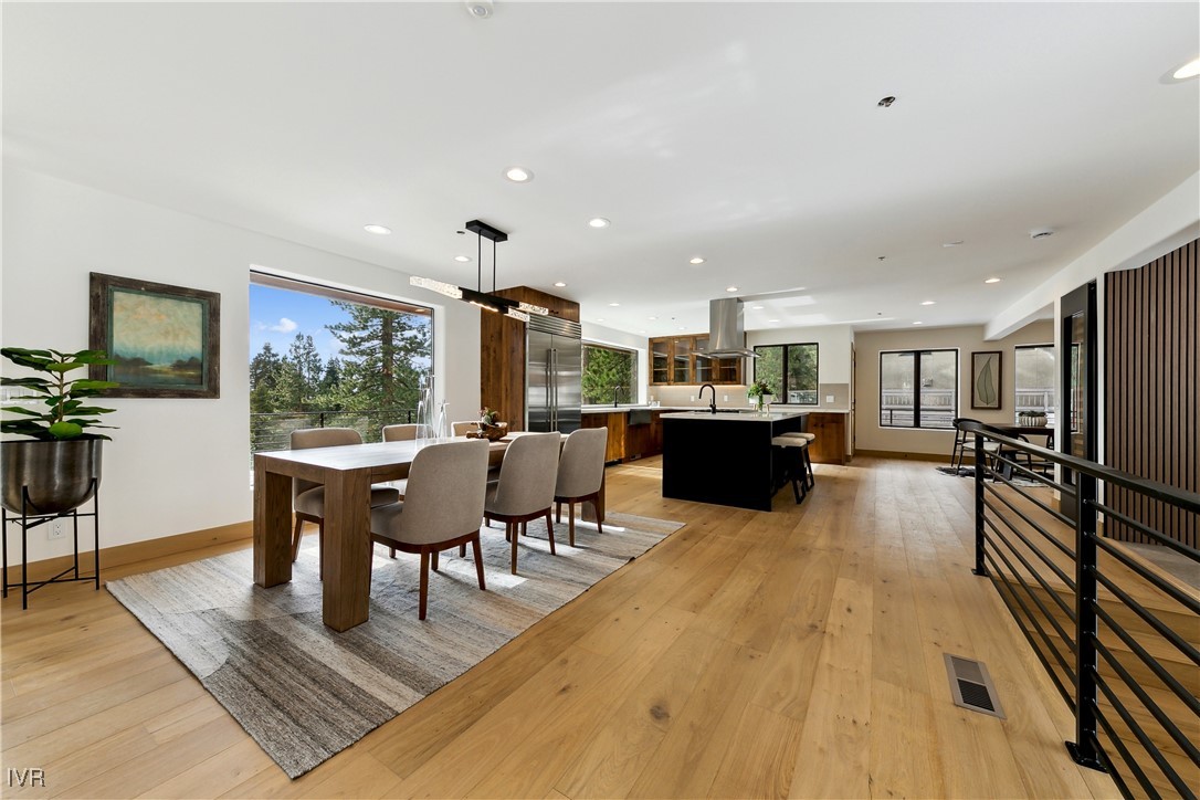 987 Wander Way Incline Village, NV 89451 - Photo 14 of 45 a dining hall with stainless steel appliances granite countertop a couch dining table and chairs