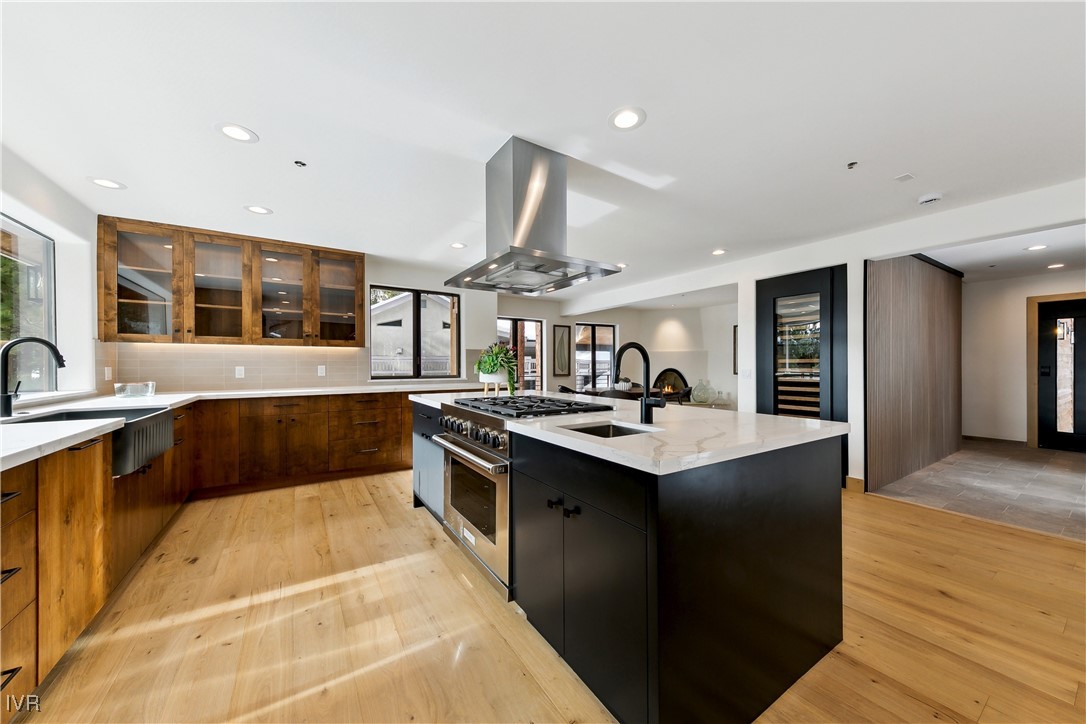 987 Wander Way Incline Village, NV 89451 - Photo 18 of 45 a kitchen with stainless steel appliances granite countertop a sink and a stove