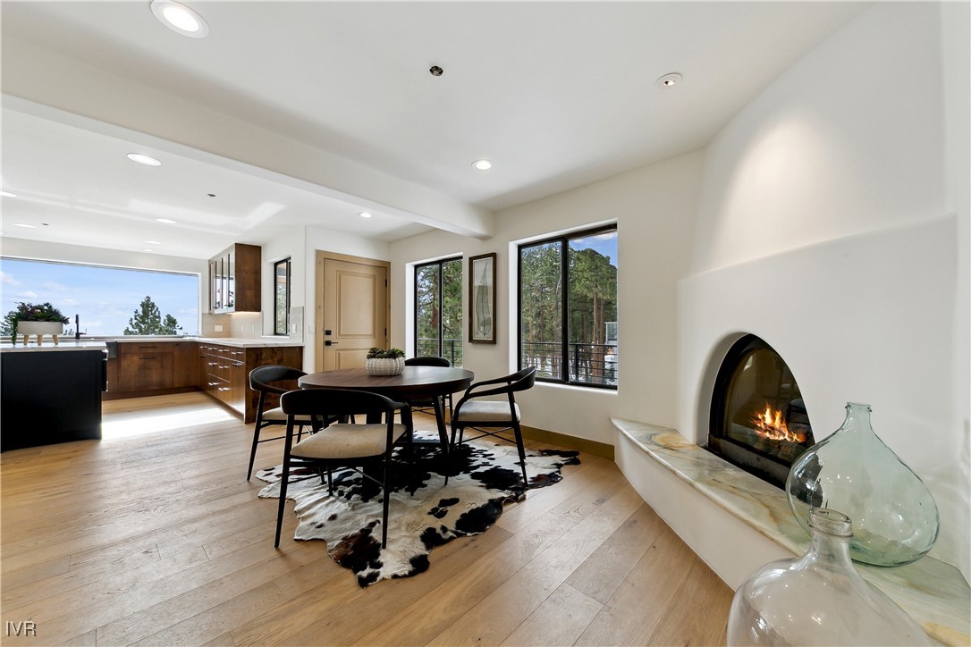 987 Wander Way Incline Village, NV 89451 - Photo 21 of 45 a view of a dining room with furniture and wooden floor