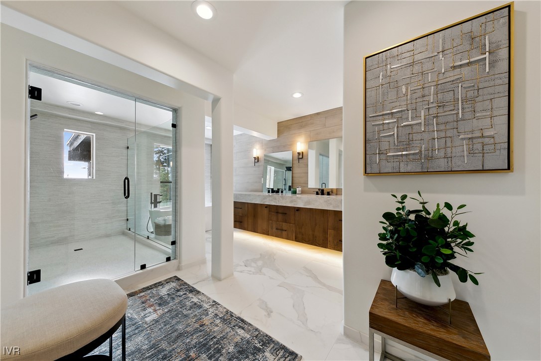 987 Wander Way Incline Village, NV 89451 - Photo 25 of 45 a view of a bathroom with a tub shower and mirror