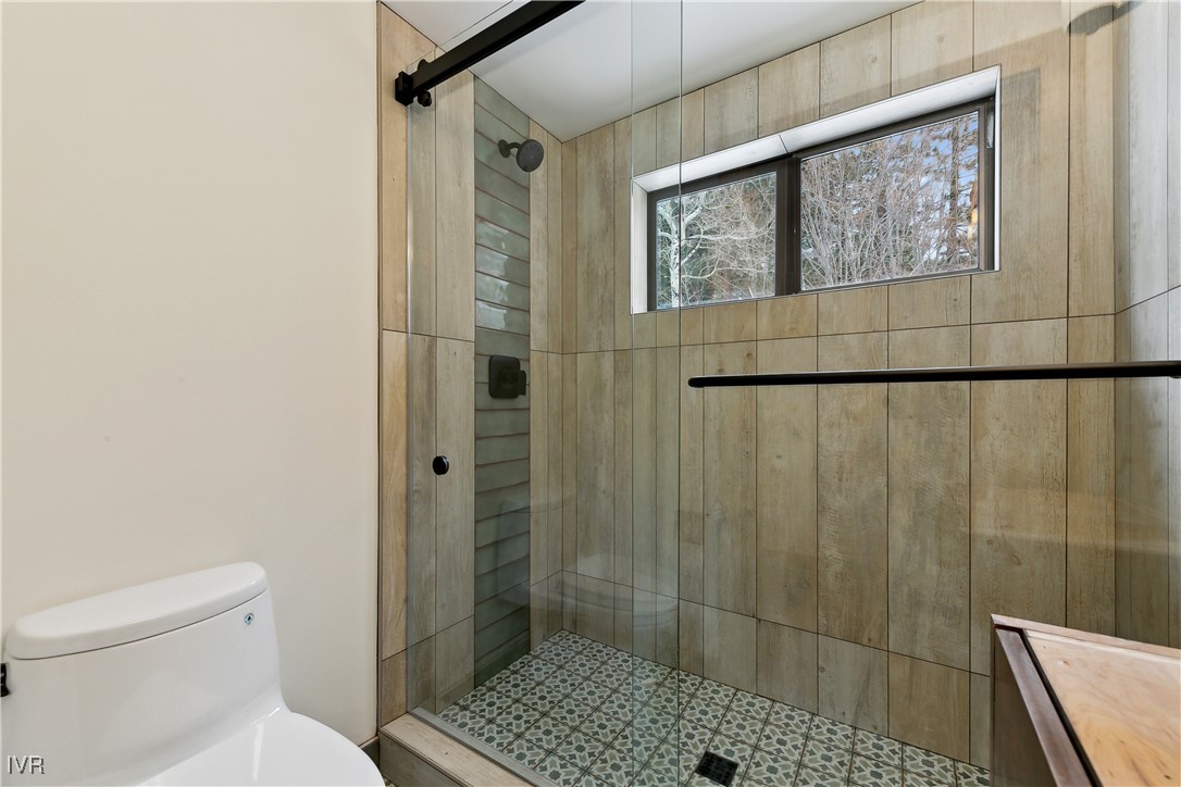 987 Wander Way Incline Village, NV 89451 - Photo 30 of 45 a bathroom with a shower toilet and sink