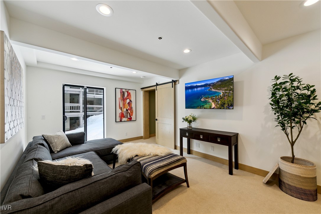 987 Wander Way Incline Village, NV 89451 - Photo 32 of 45 a living room with furniture and a potted plant