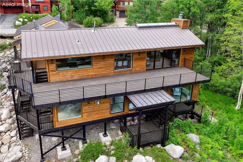 a backyard of a house with lots of green space
