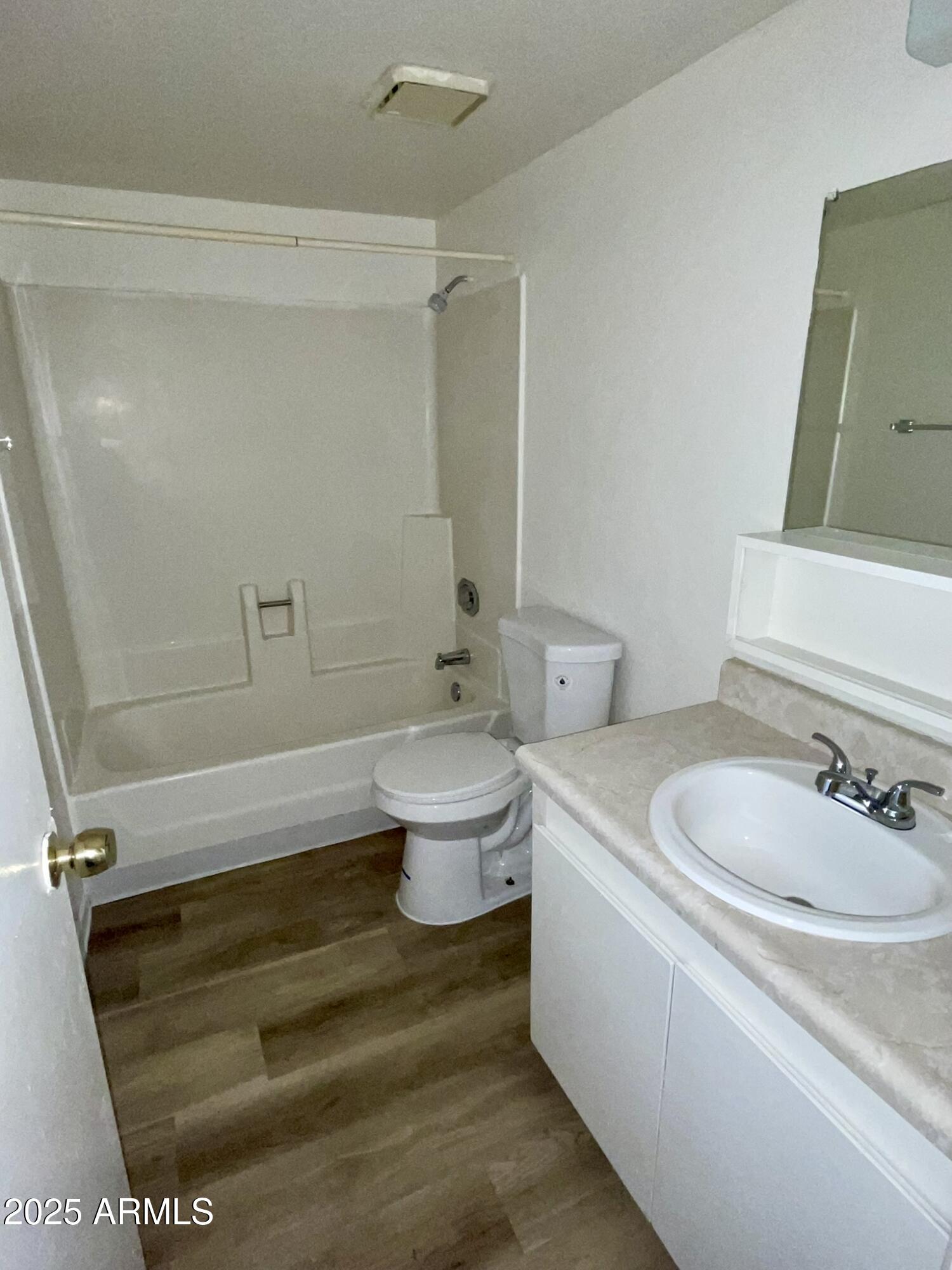 2002 East Sweetwater Avenue, Unit 202 Phoenix, AZ 85022 - Photo 12 of 22 a bathroom with a sink toilet and shower