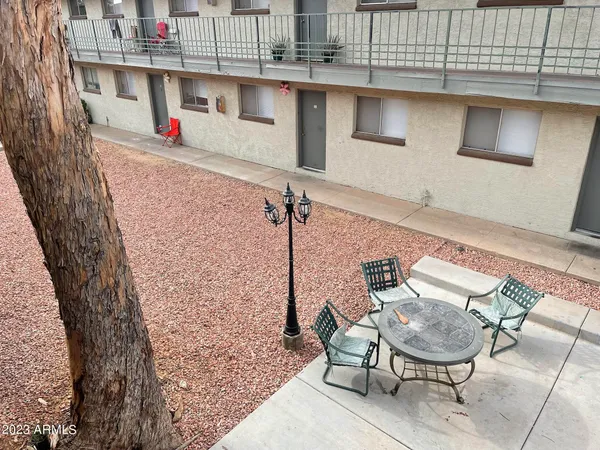 a view of balcony with seating area