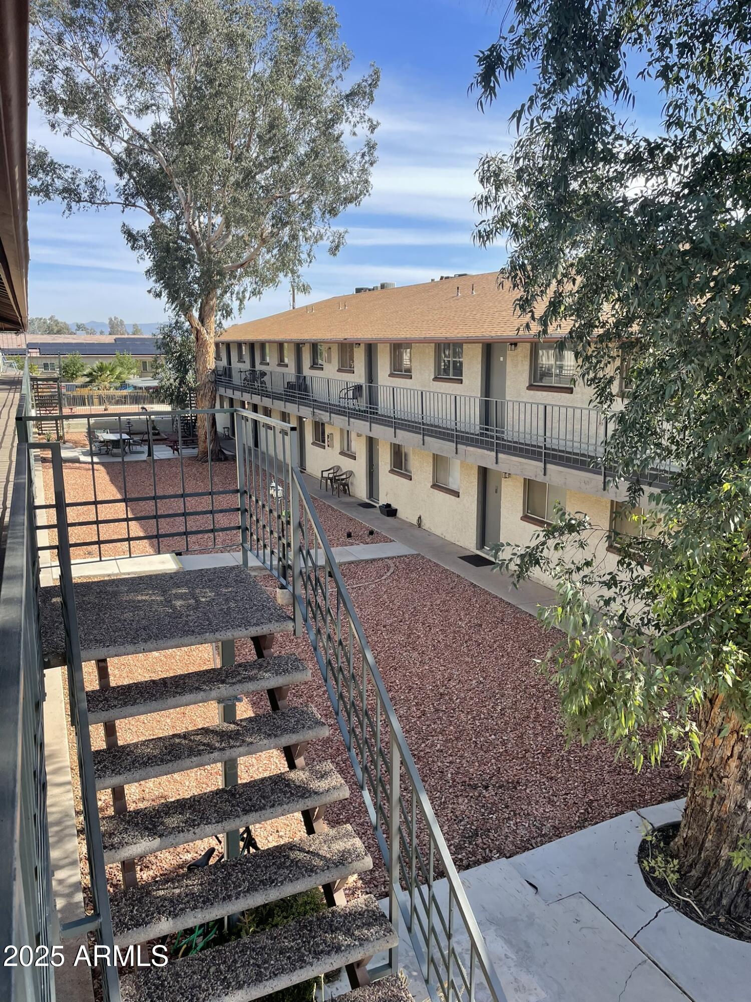 2002 East Sweetwater Avenue, Unit 202 Phoenix, AZ 85022 - Photo 16 of 22 a balcony with lots of green space