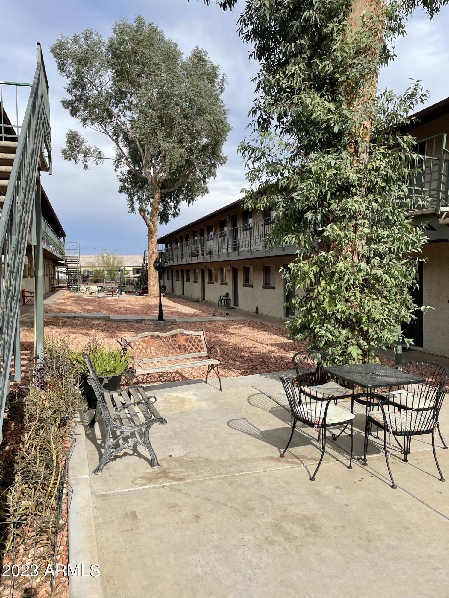 2002 East Sweetwater Avenue, Unit 202 Phoenix, AZ 85022 - Photo 17 of 22 a view of a backyard with a patio