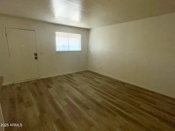 an empty room with a window