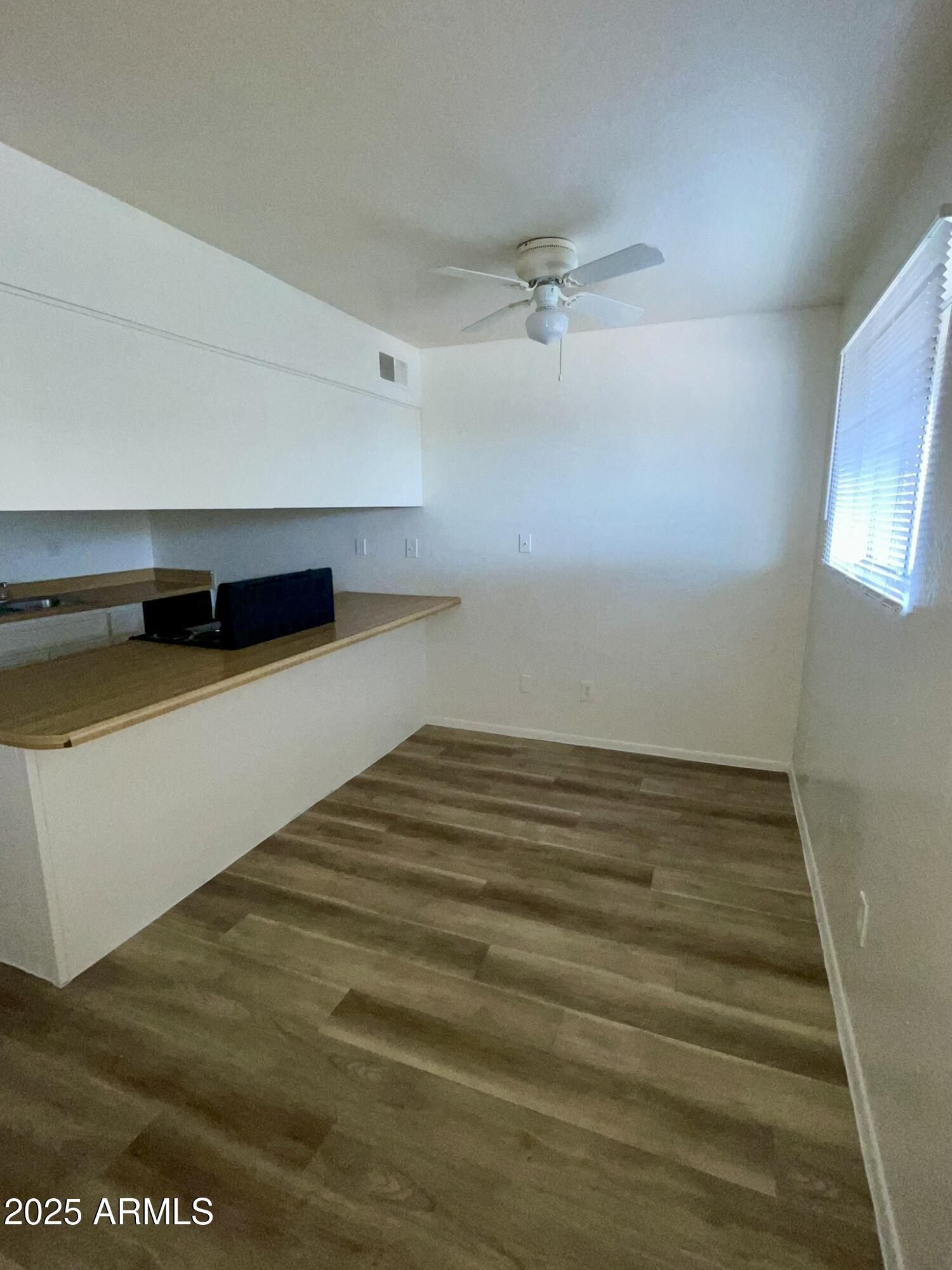 2002 East Sweetwater Avenue, Unit 202 Phoenix, AZ 85022 - Photo 10 of 22 a room with a bed